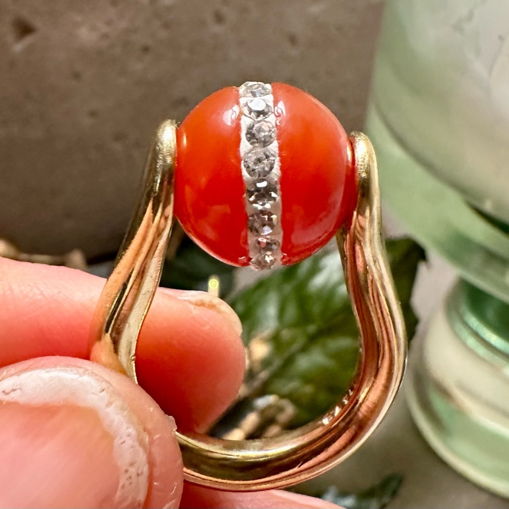 Unique Tension Ring with assorted colored beads with rhinestones.